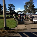 Golfers warm up on Little River Golf Course driving range