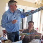 Visiting Rotarians Carsten and Susanne Zehm share gifts with our club.